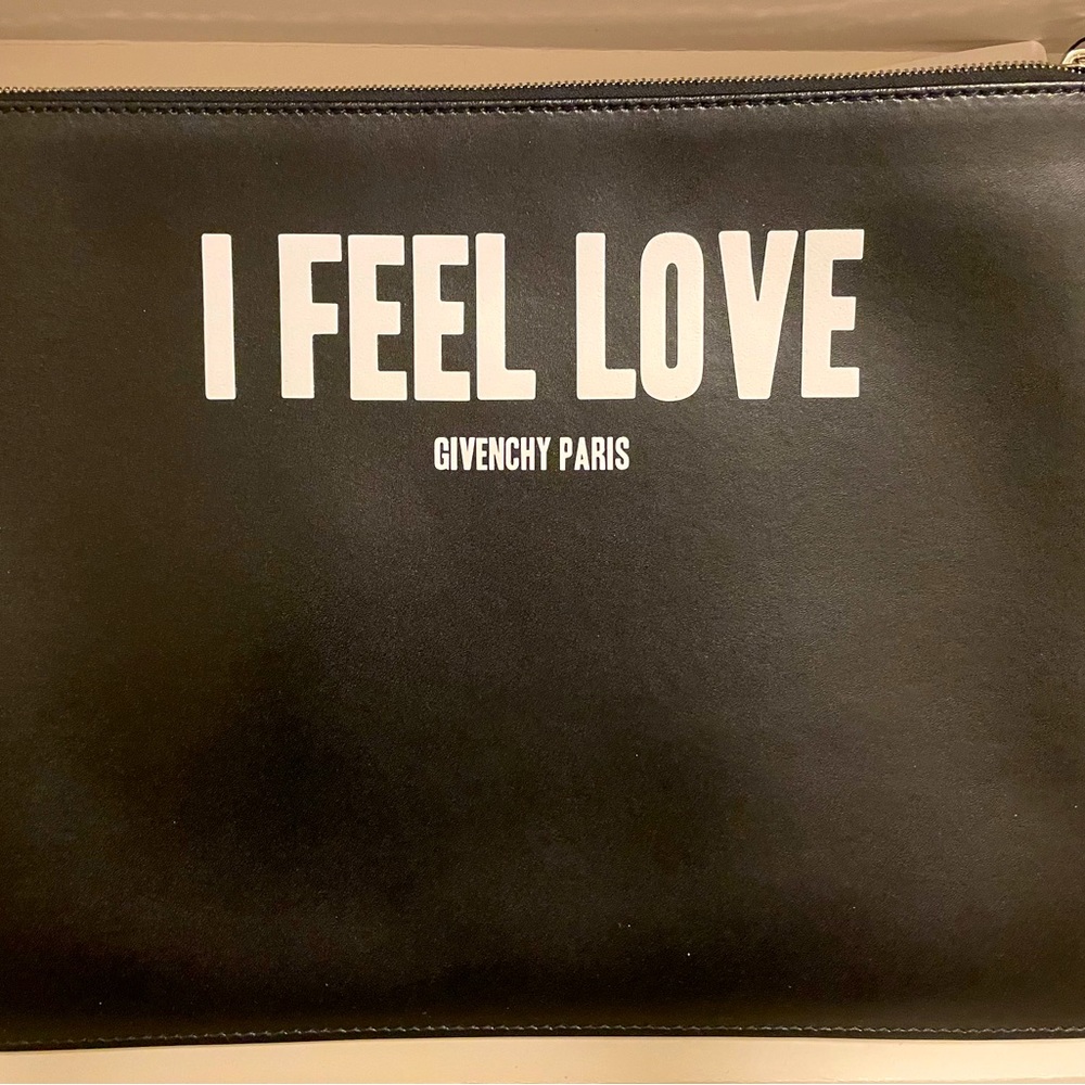 Iconic and Rare Givenchy I FEEL LOVE Clutch In Like New Condition